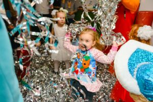 photo of girl having fun in birthday party