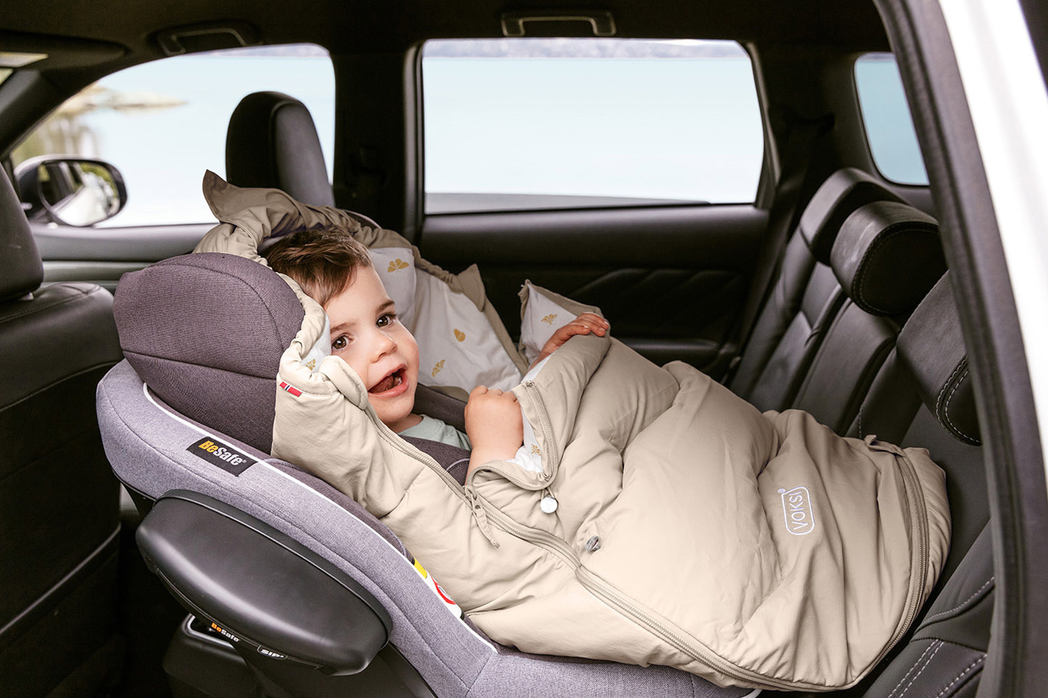 Poncza, otulacze i śpiworki do fotelików samochodowych